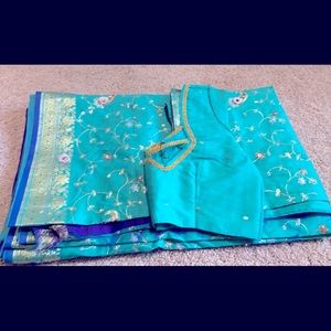 Beautiful embroidered silk Saree with stitched blouse ready to wear.